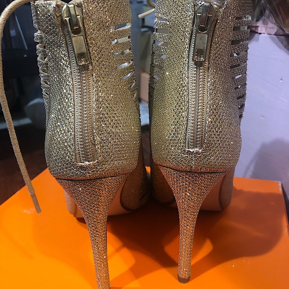 Sparkly lace up gold heels, only worn once.